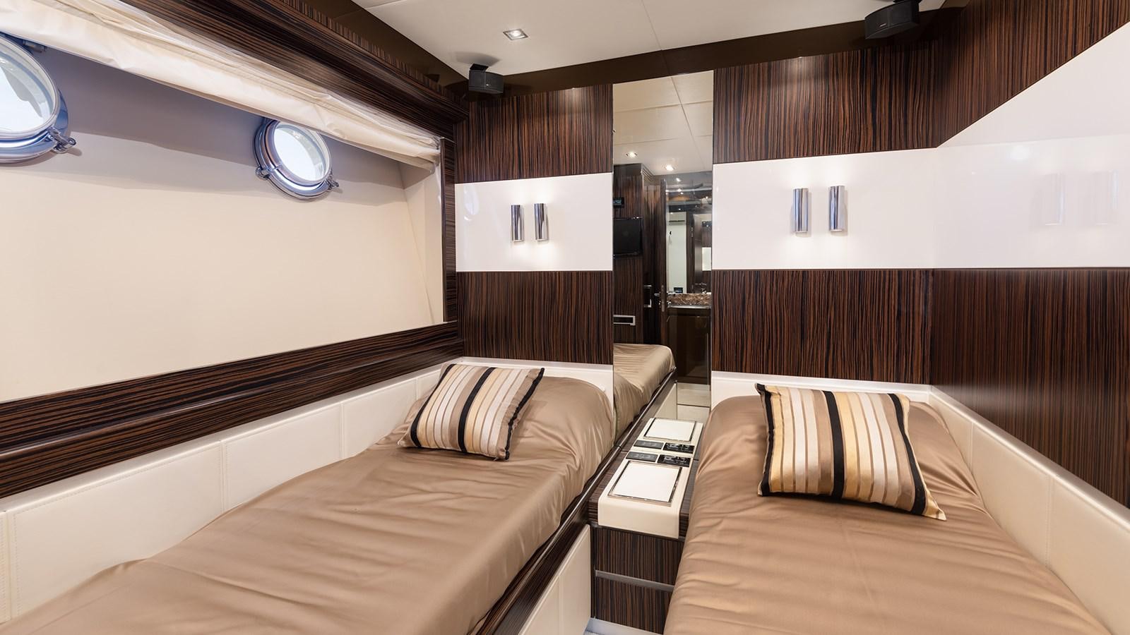 a room with a bed and a couch aboard FRADI Yacht for Sale