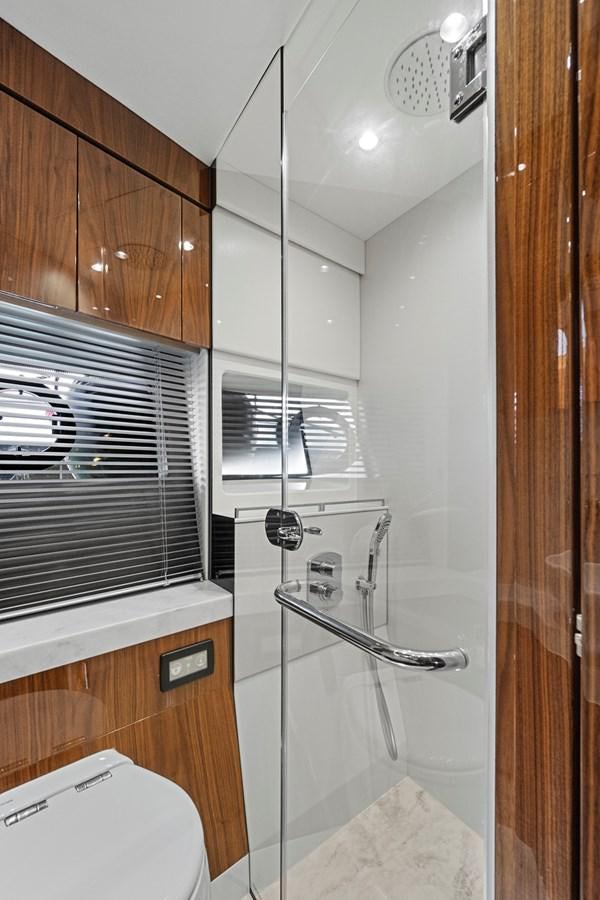 a shower unit in a bathroom aboard EXIT Yacht for Sale