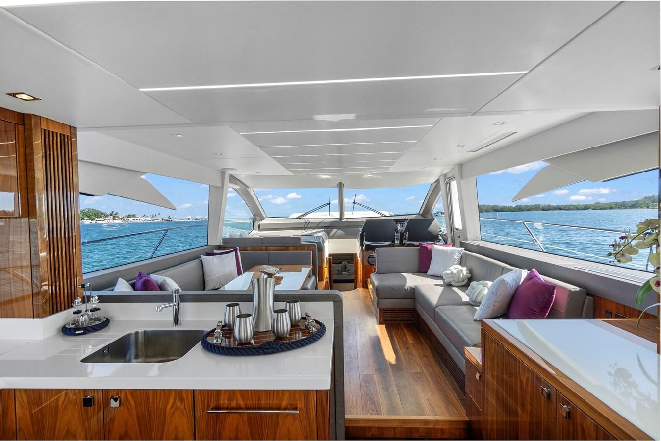 a living room with a large window aboard EXIT Yacht for Sale