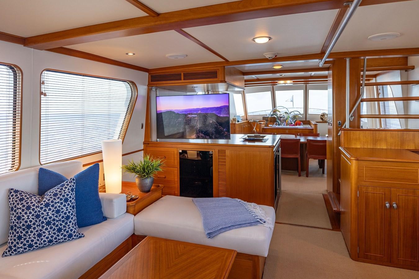 a living room with a couch and a tv aboard SEA BOLD Yacht for Sale