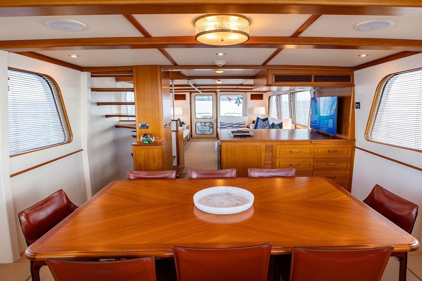 a large kitchen with a table and chairs aboard SEA BOLD Yacht for Sale