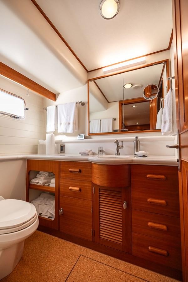 a bathroom with a large mirror aboard SEA BOLD Yacht for Sale