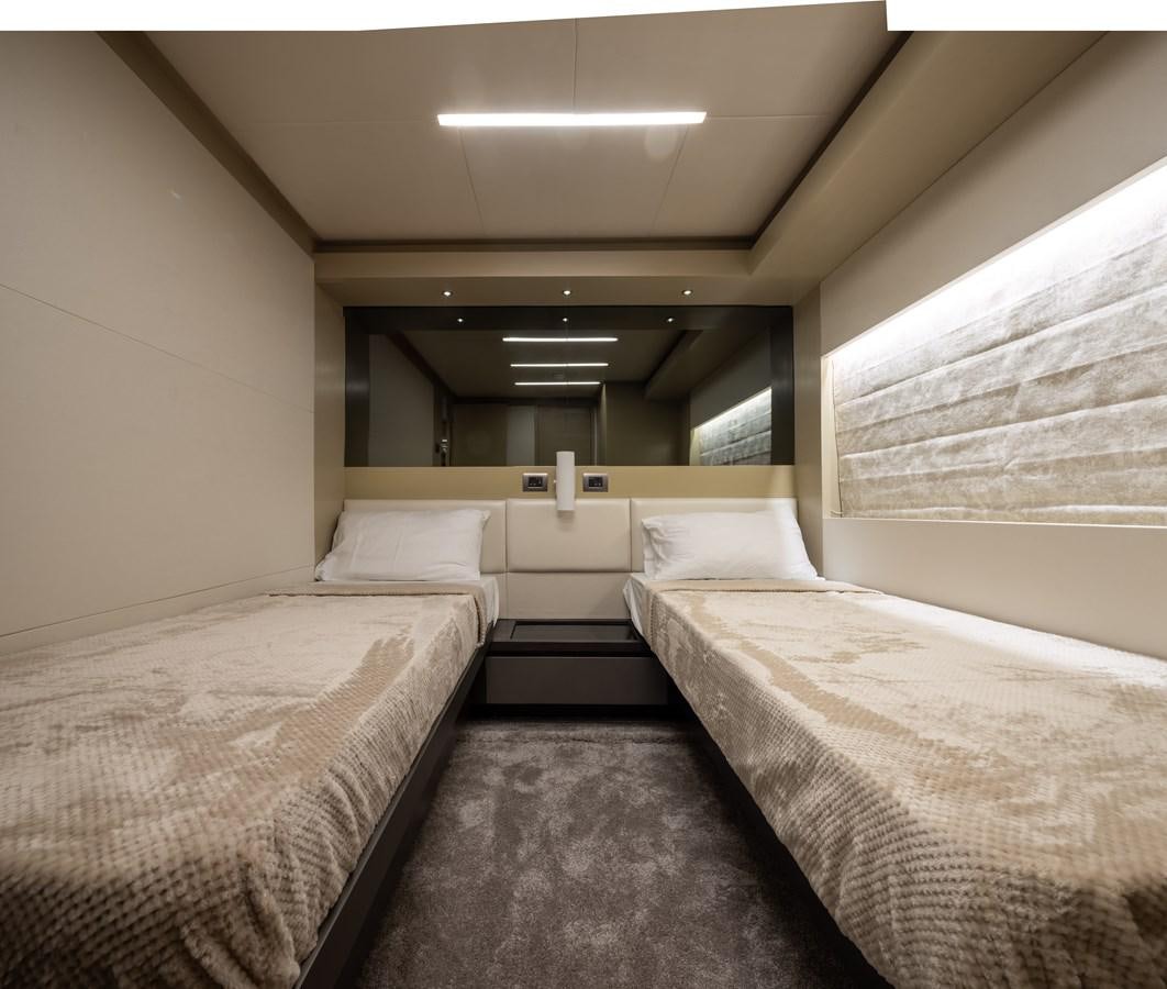 a room with beds and a window aboard RODINIA 2 Yacht for Sale