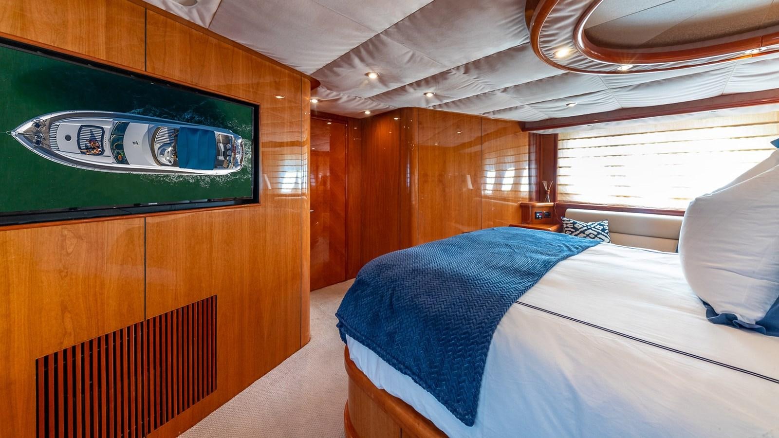 a bed in a room aboard ICONIC Yacht for Sale