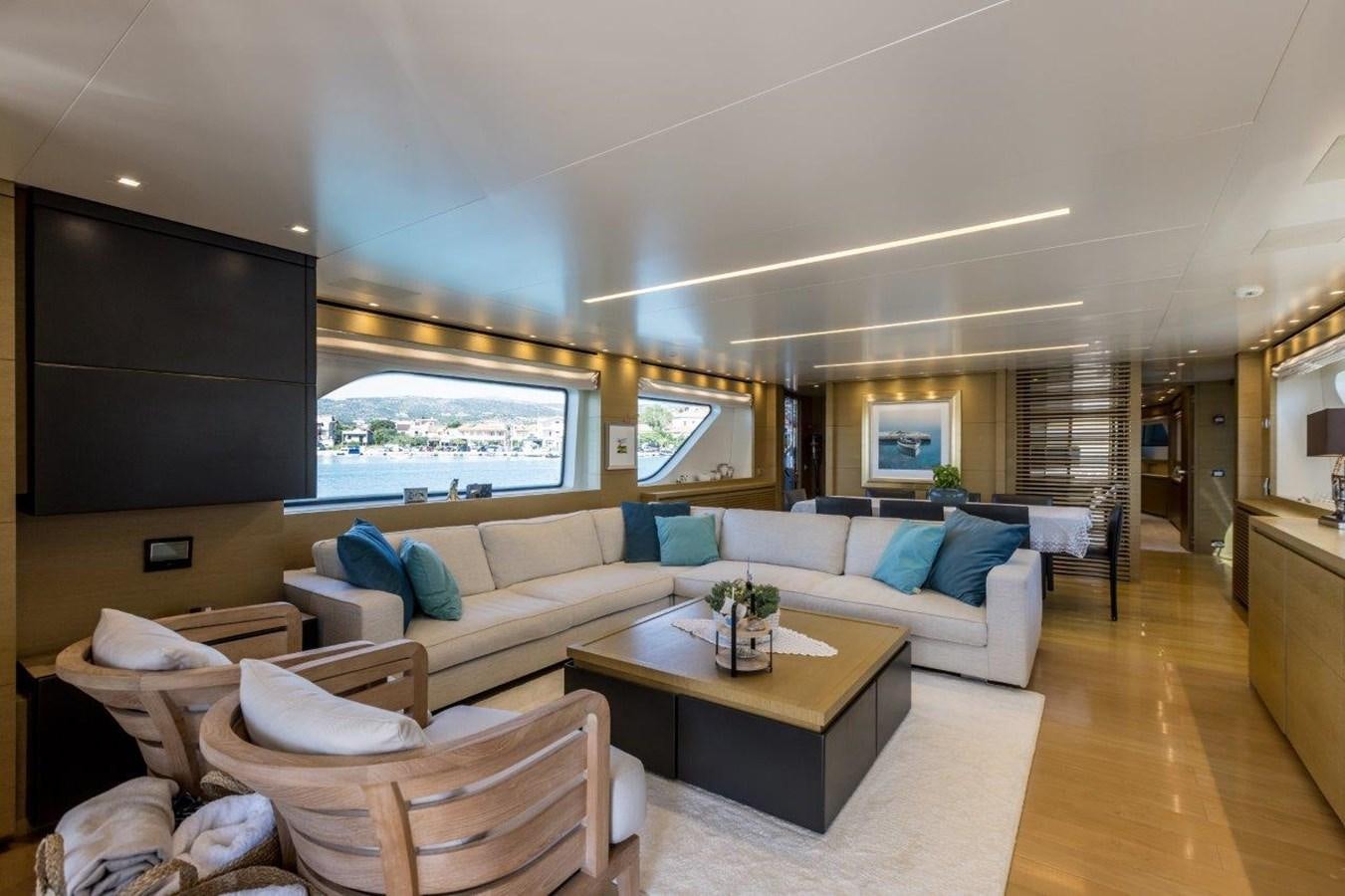 a living room with a large window aboard SANLORENZO SD 92 Yacht for Sale