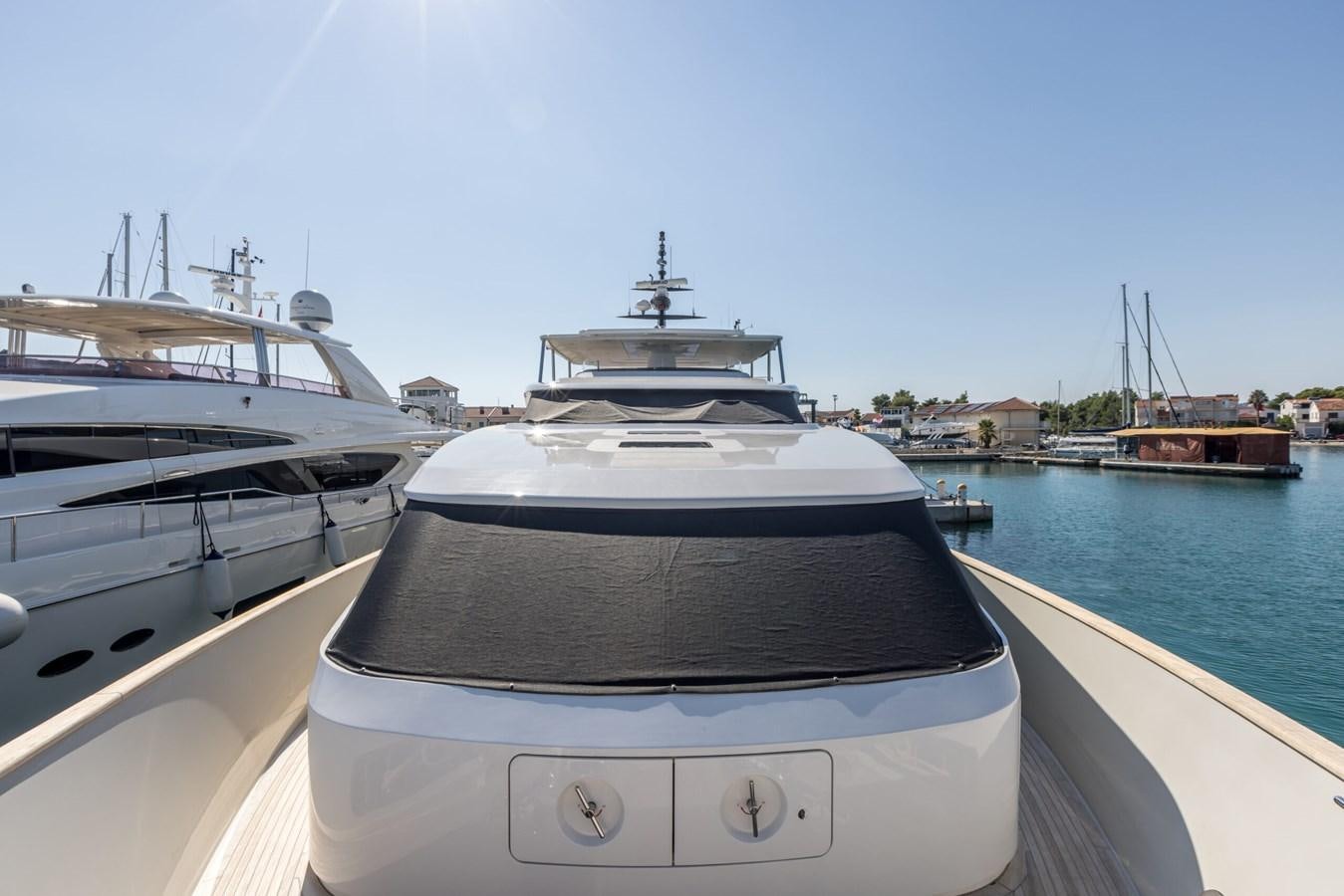 a boat is parked on the water aboard SANLORENZO SD 92 Yacht for Sale