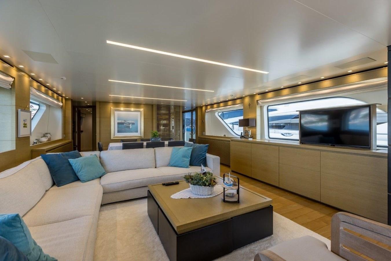a living room with a couch and a table aboard SANLORENZO SD 92 Yacht for Sale