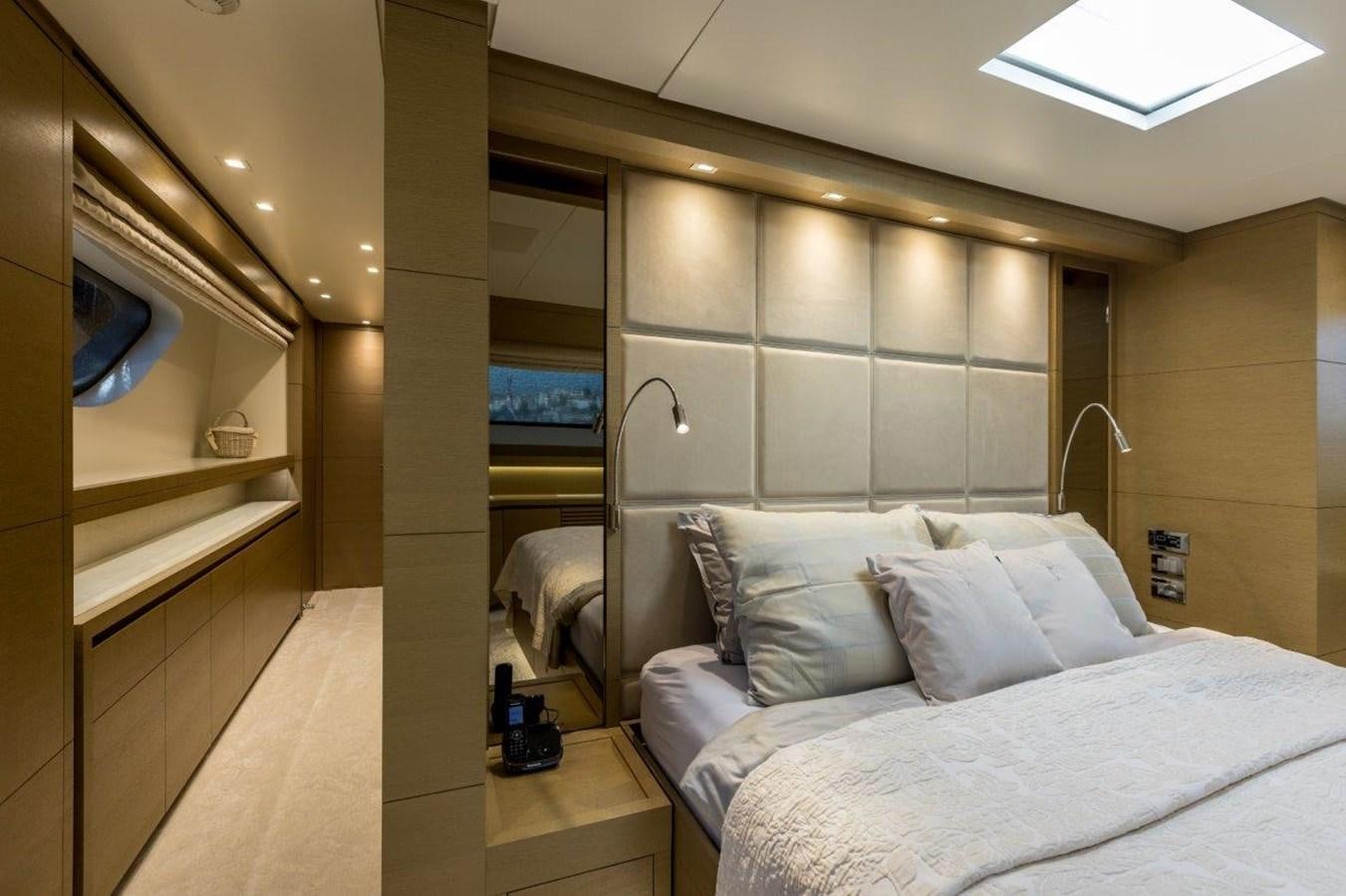 a bed with white sheets aboard SANLORENZO SD 92 Yacht for Sale