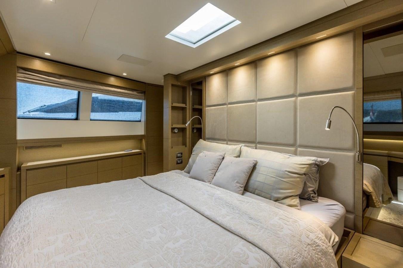 a bed with white sheets aboard SANLORENZO SD 92 Yacht for Sale