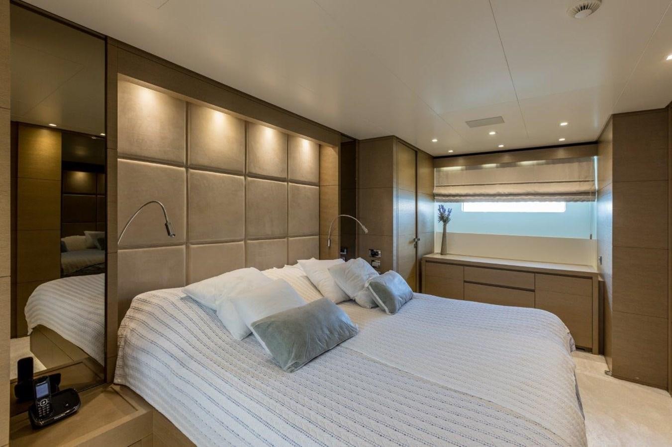a bed with white sheets aboard SANLORENZO SD 92 Yacht for Sale