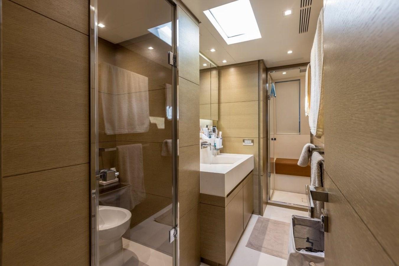 a bathroom with a glass shower aboard SANLORENZO SD 92 Yacht for Sale