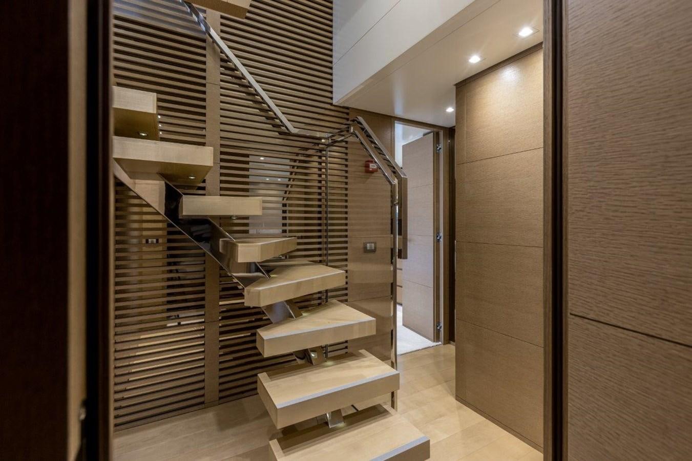 a set of stairs in a room aboard SANLORENZO SD 92 Yacht for Sale