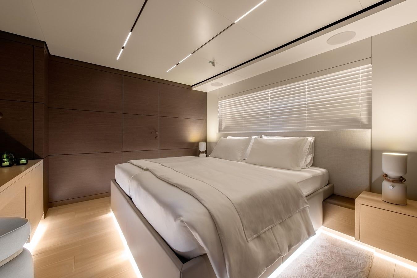 a bed in a room aboard PALOMA Yacht for Sale