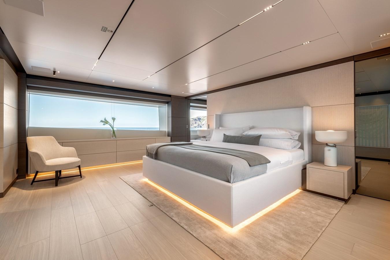 a bedroom with a large bed aboard PALOMA Yacht for Sale