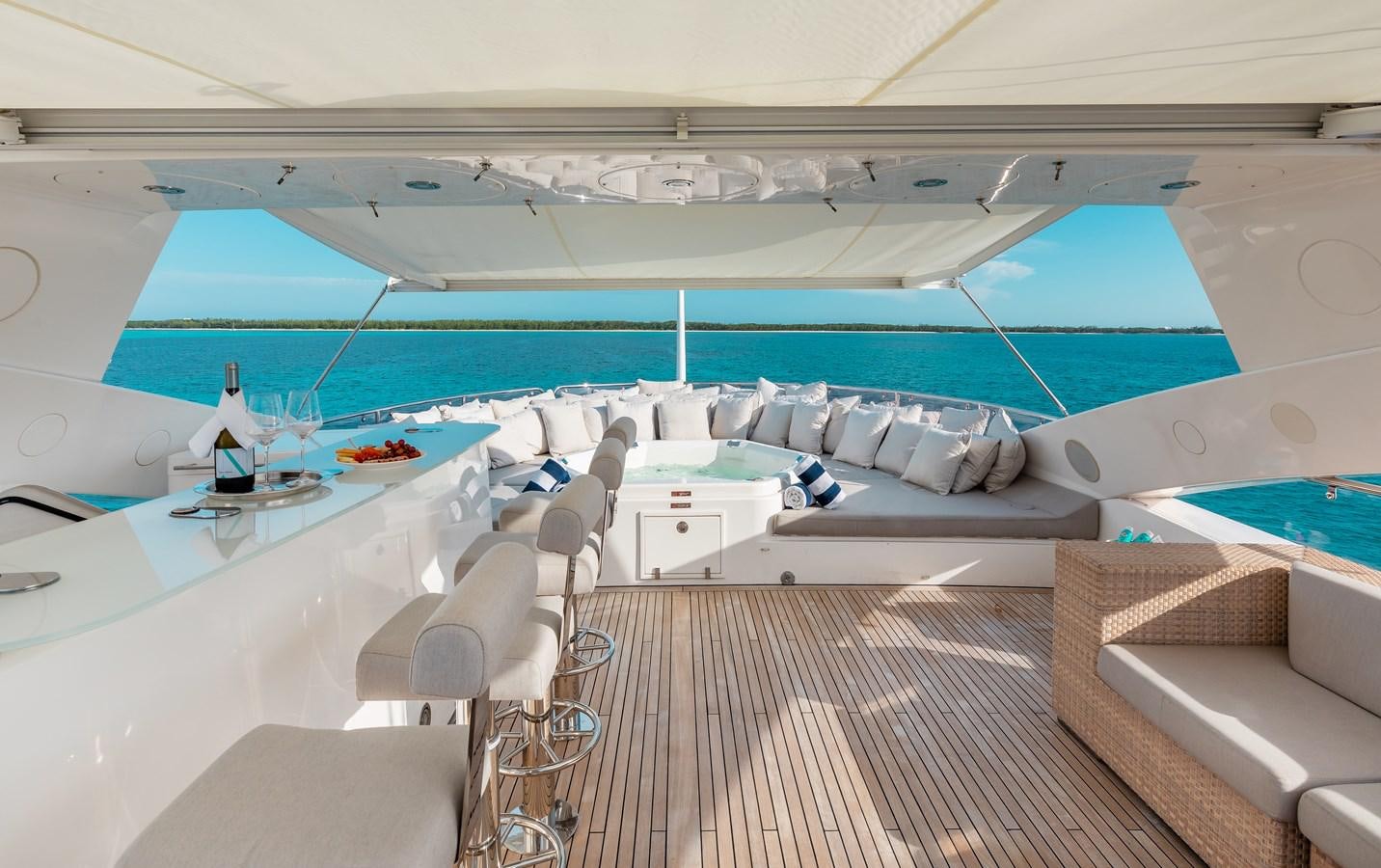 a room with a couch and a pool aboard AQUARIUM Yacht for Sale