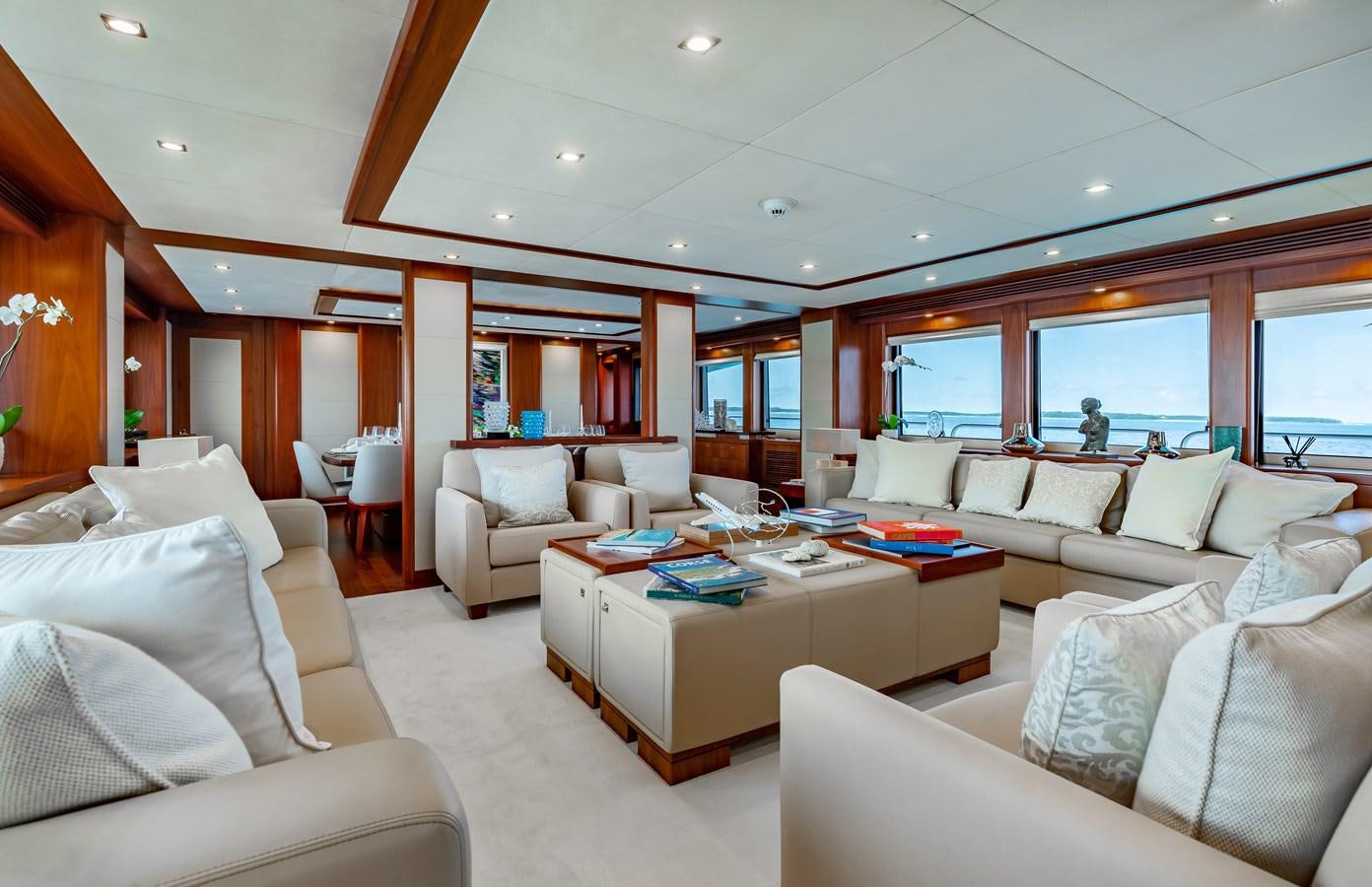 a living room with a large window aboard AQUARIUM Yacht for Sale