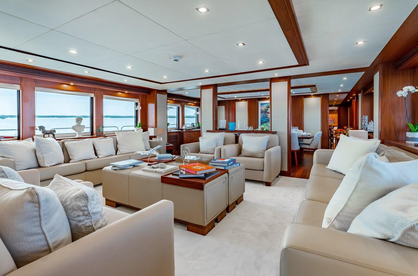 a living room with a large window aboard AQUARIUM Yacht for Sale