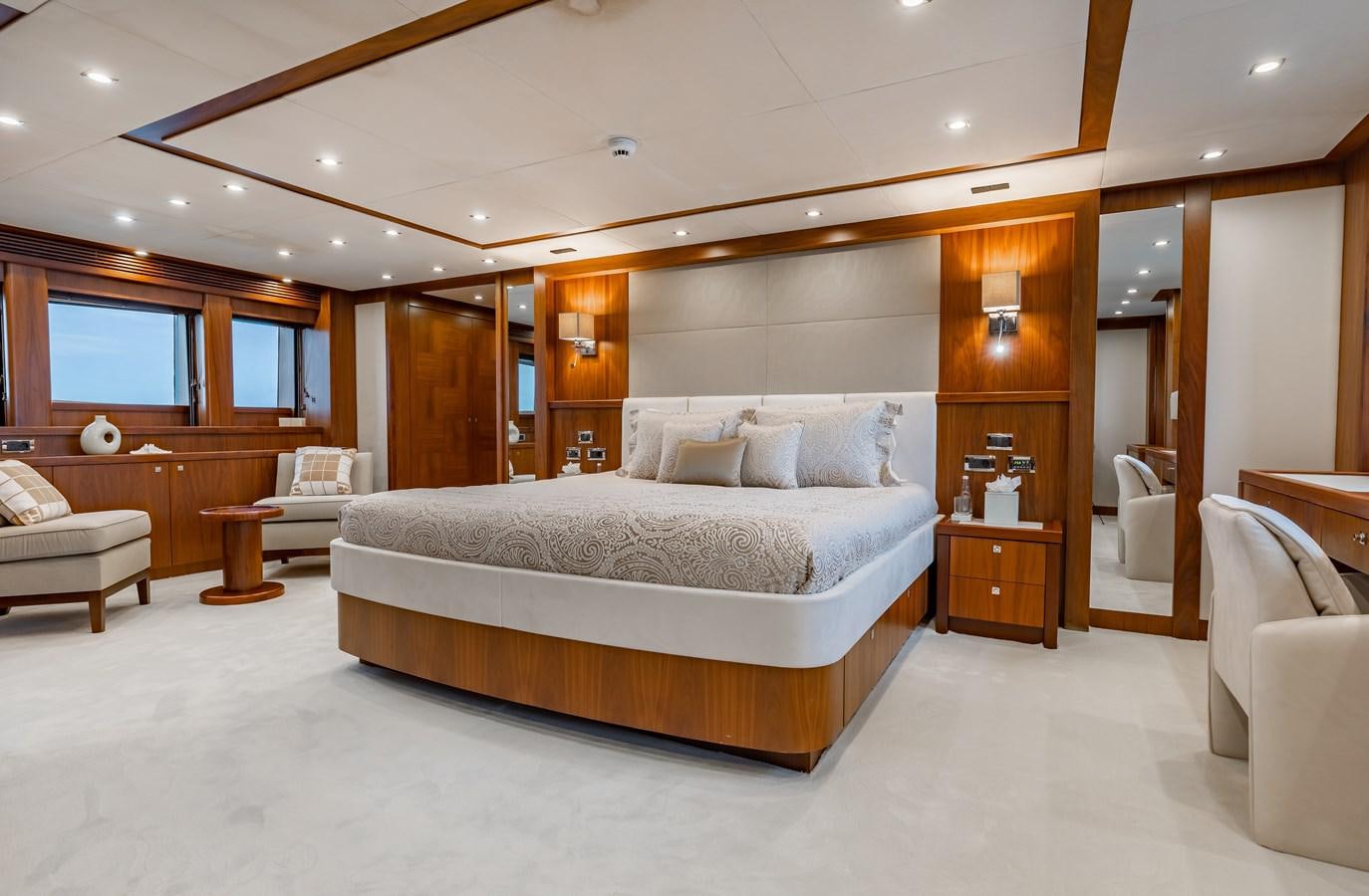 a large bedroom with a large bed aboard AQUARIUM Yacht for Sale