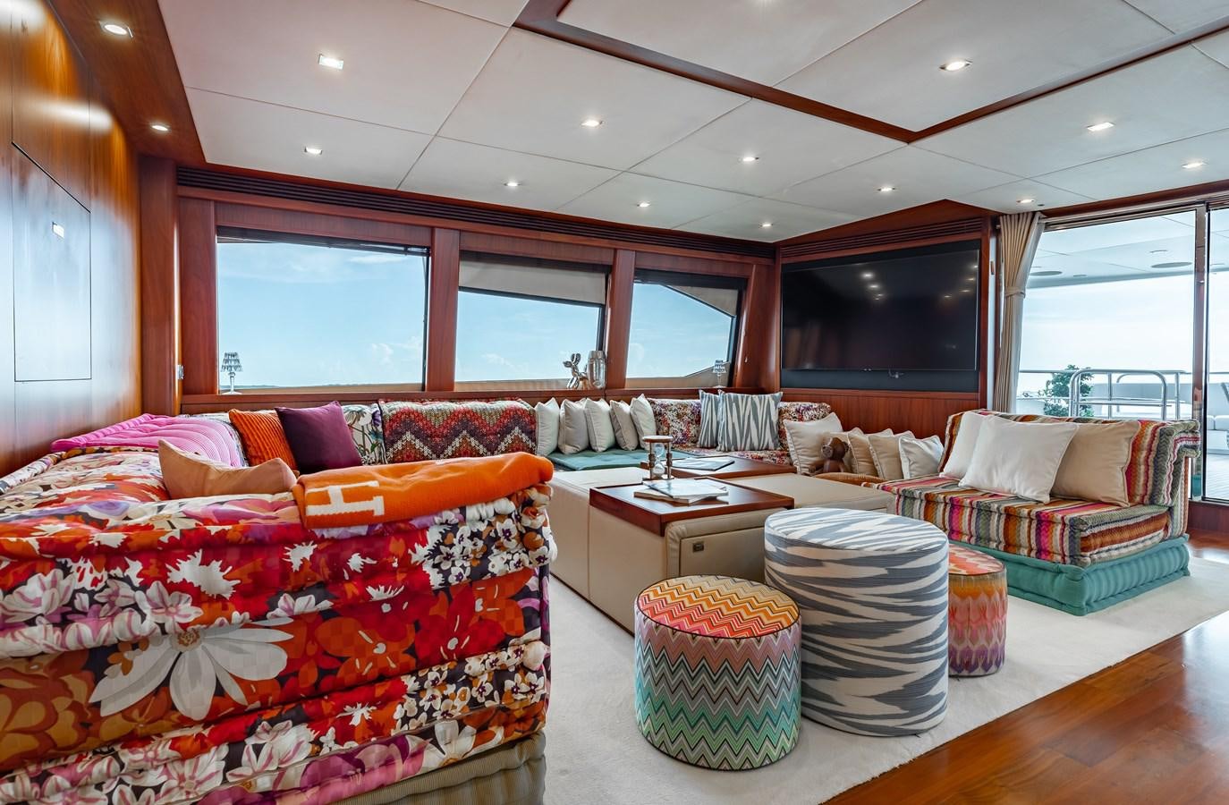 a living room with a couch and a table aboard AQUARIUM Yacht for Sale