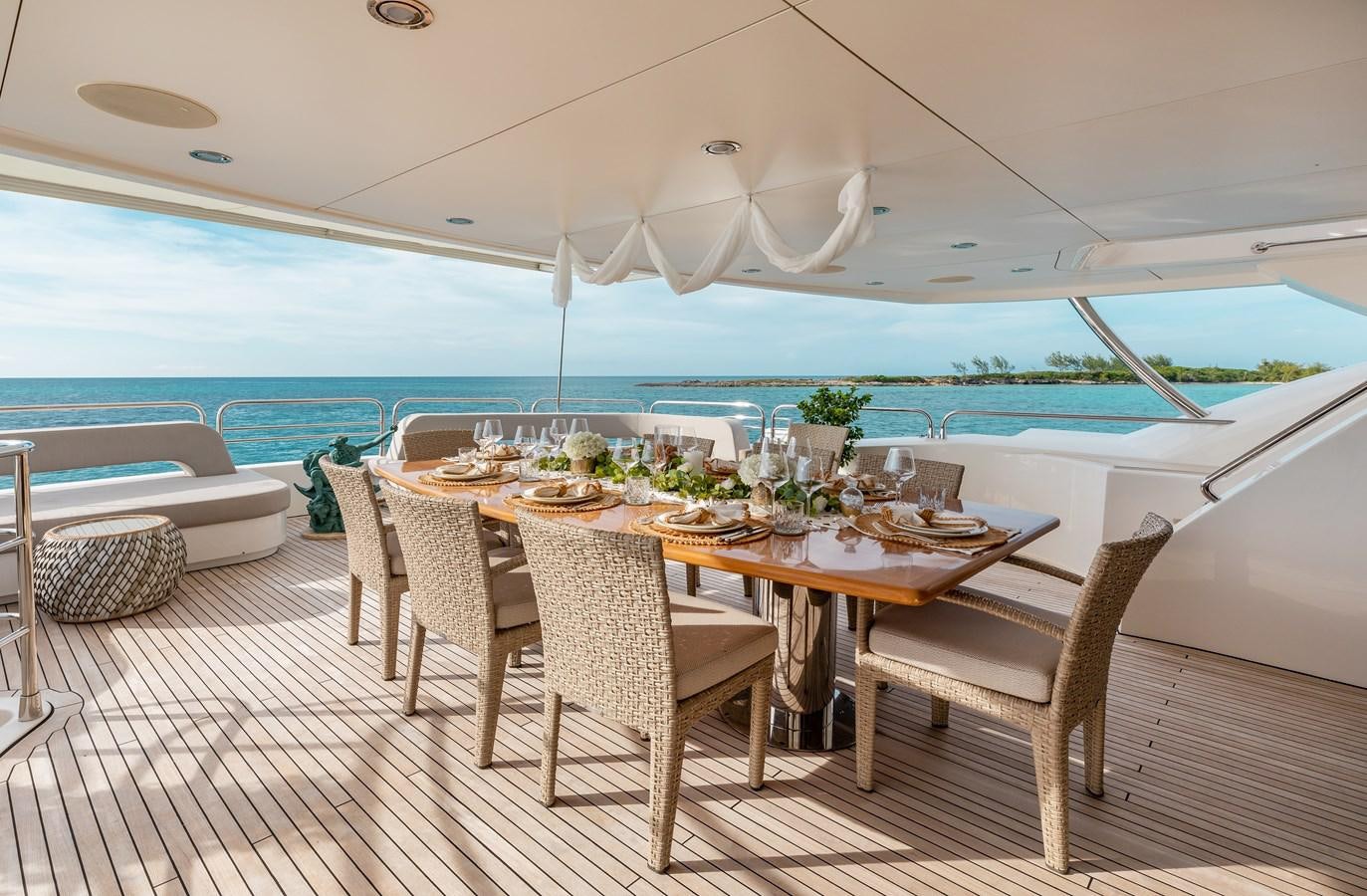 a table set for a meal aboard AQUARIUM Yacht for Sale