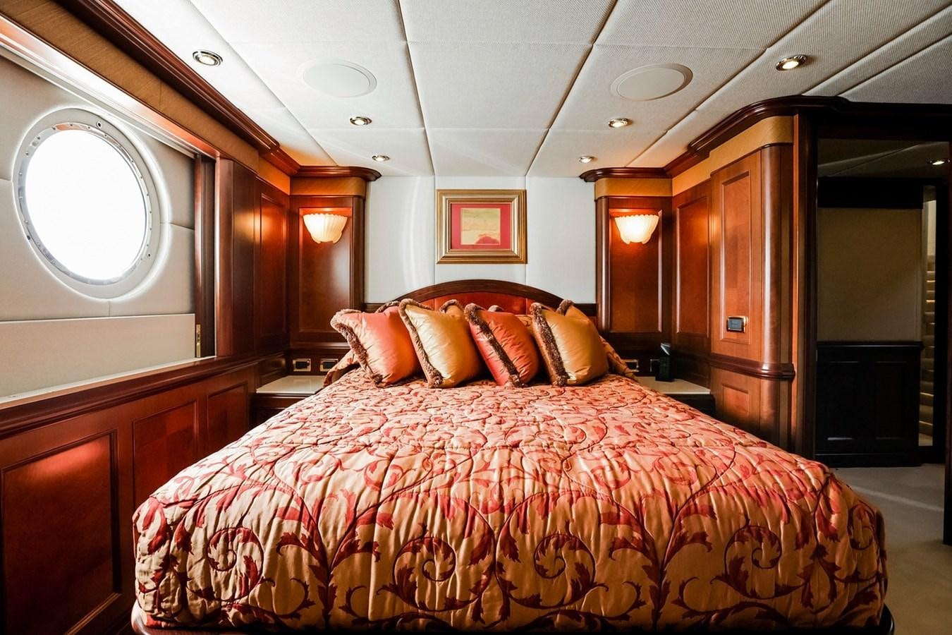 a large bed in a hotel room aboard CRYSTAL LADY Yacht for Sale