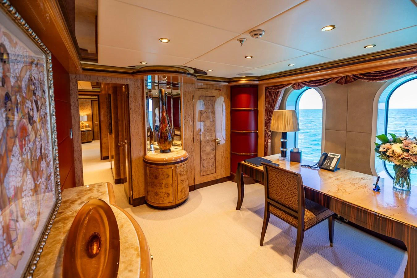 a large room with a table and chairs aboard ELIS ET MAR Yacht for Sale