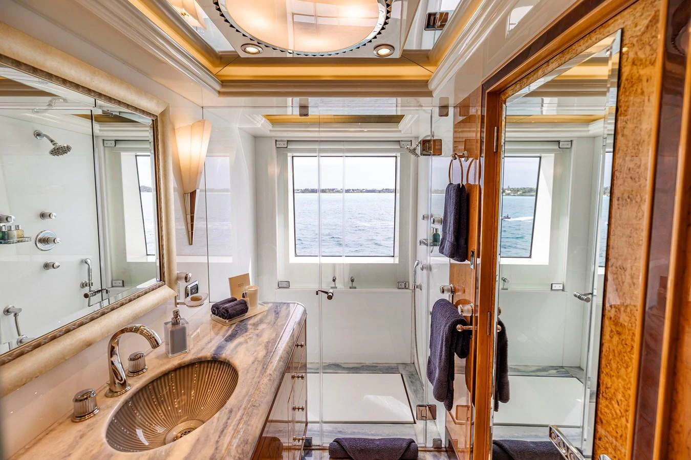a bathroom with a sink and a mirror aboard ELIS ET MAR Yacht for Sale