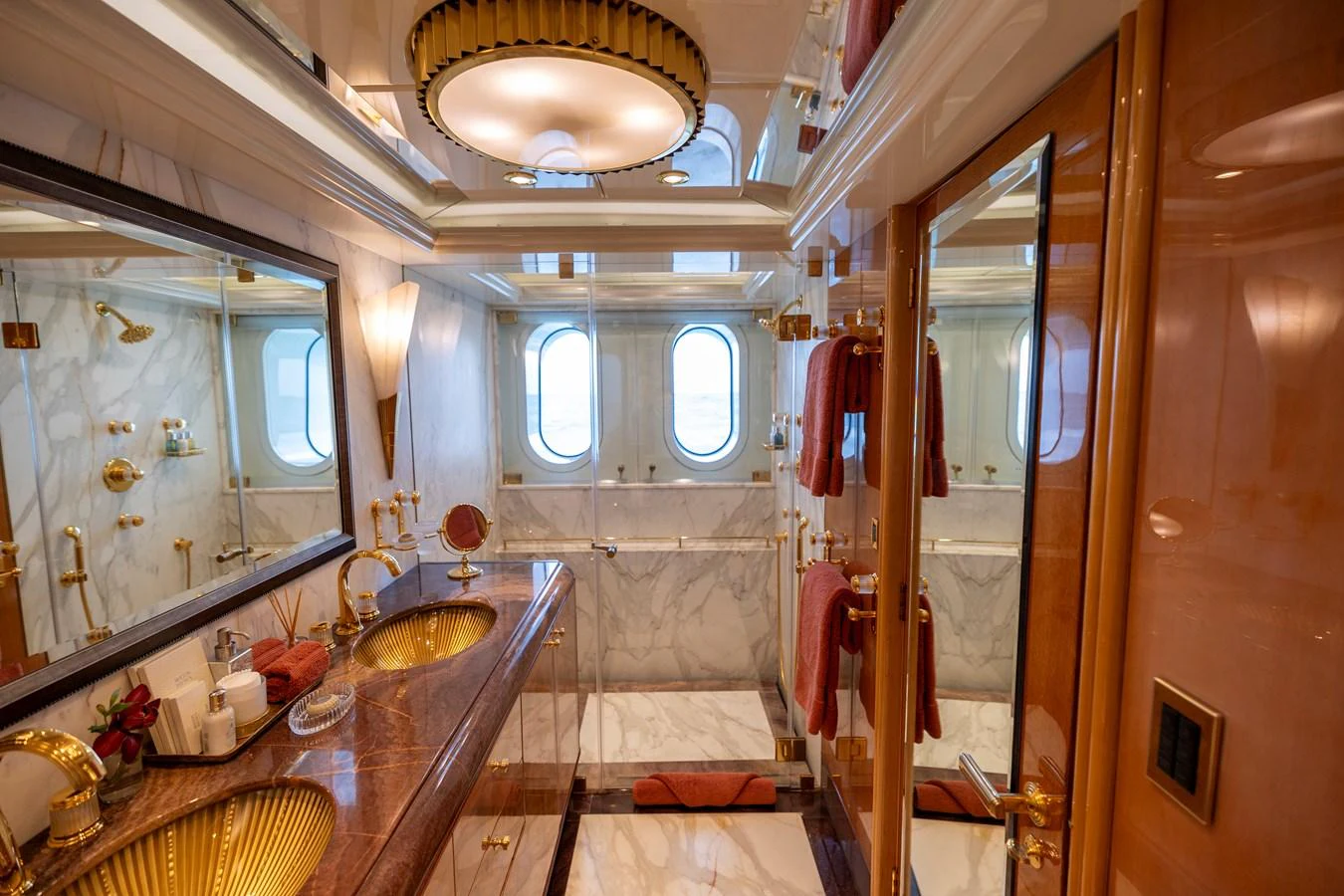 a bathroom with a sink and a mirror aboard ELIS ET MAR Yacht for Sale
