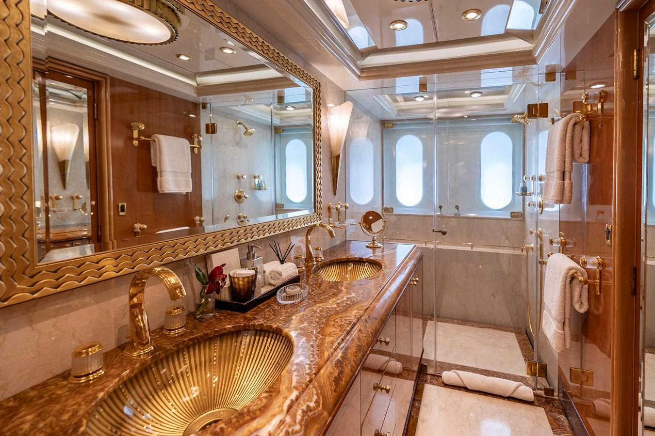 a bathroom with a sink and a mirror aboard ELIS ET MAR Yacht for Sale