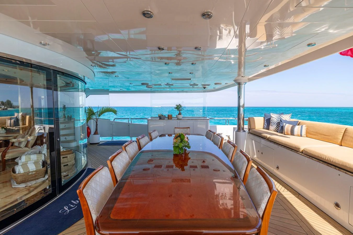 a room with a table and chairs aboard ELIS ET MAR Yacht for Sale