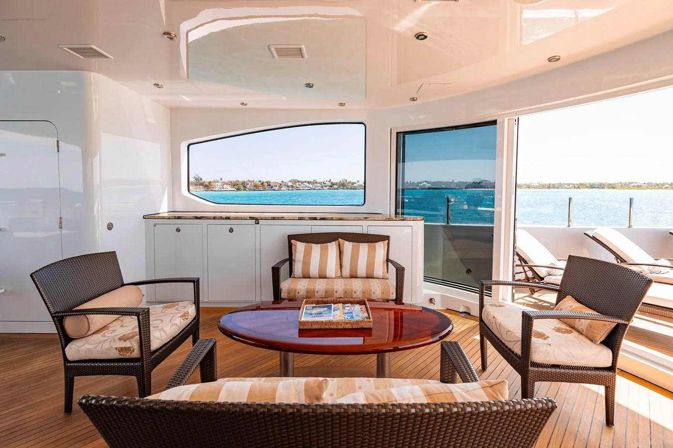 a living room with a large window aboard ELIS ET MAR Yacht for Sale