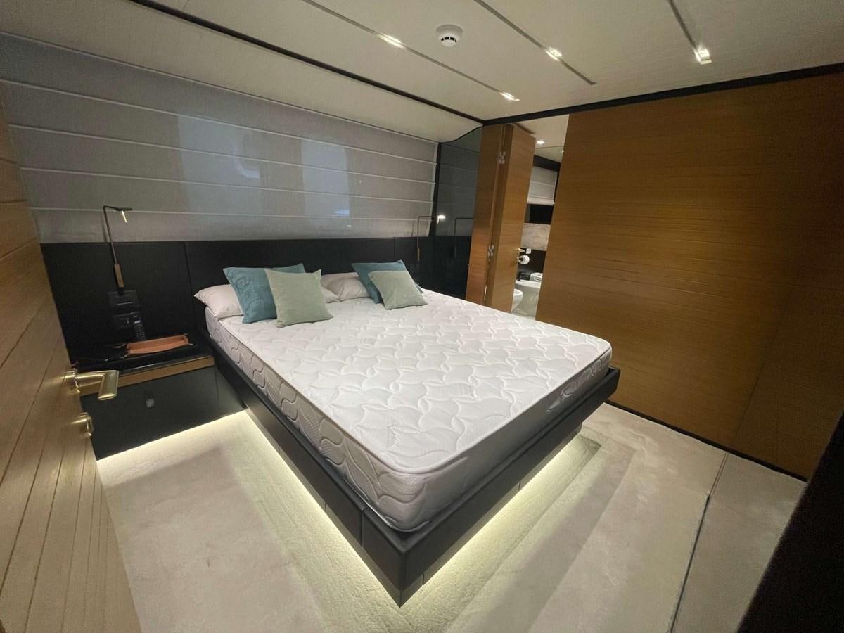 a bed in a room aboard REINE D'AZUR Yacht for Sale