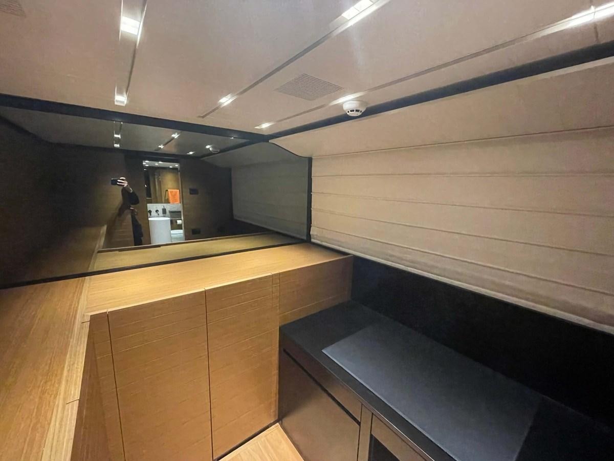 a room with a large mirror aboard REINE D'AZUR Yacht for Sale