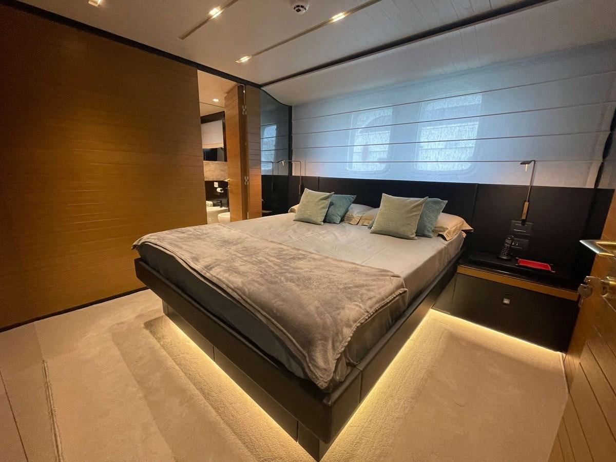 a bed in a room aboard REINE D'AZUR Yacht for Sale