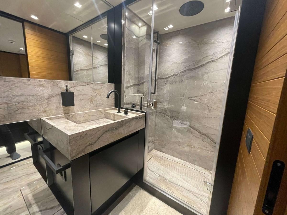 a bathroom with a marble counter aboard REINE D'AZUR Yacht for Sale
