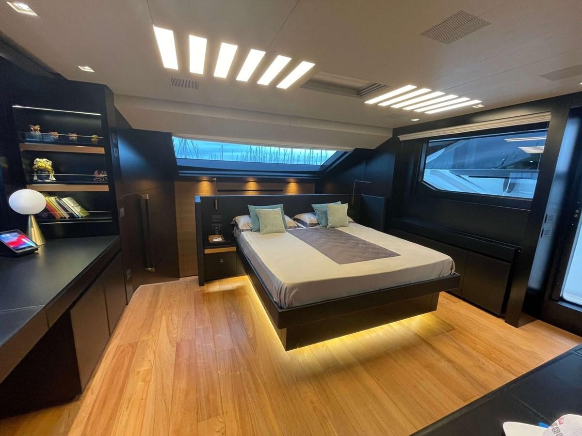 a room with a couch and a tv aboard REINE D'AZUR Yacht for Sale