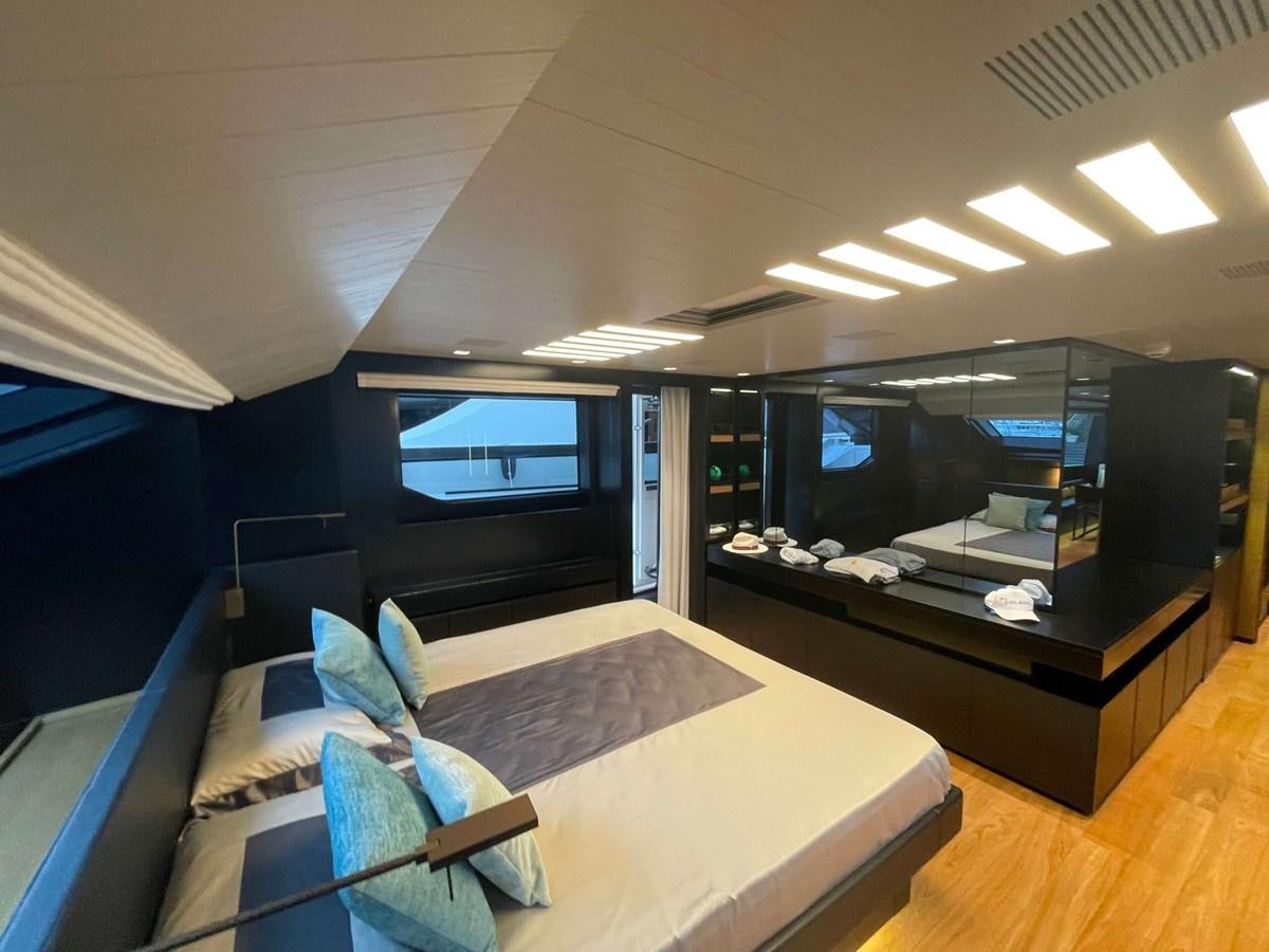 a room with a couch and a tv aboard REINE D'AZUR Yacht for Sale