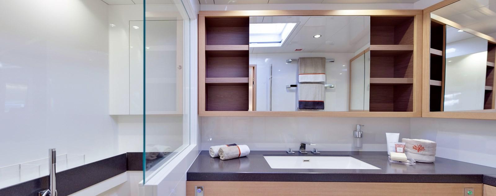 a bathroom with a sink and cabinets aboard CROSSBOW Yacht for Sale