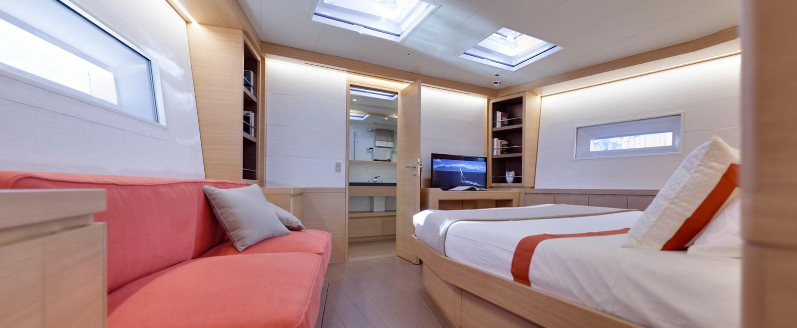 a room with a bed and a tv aboard CROSSBOW Yacht for Sale