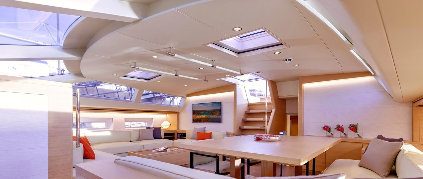 a room with a table and chairs aboard CROSSBOW Yacht for Sale