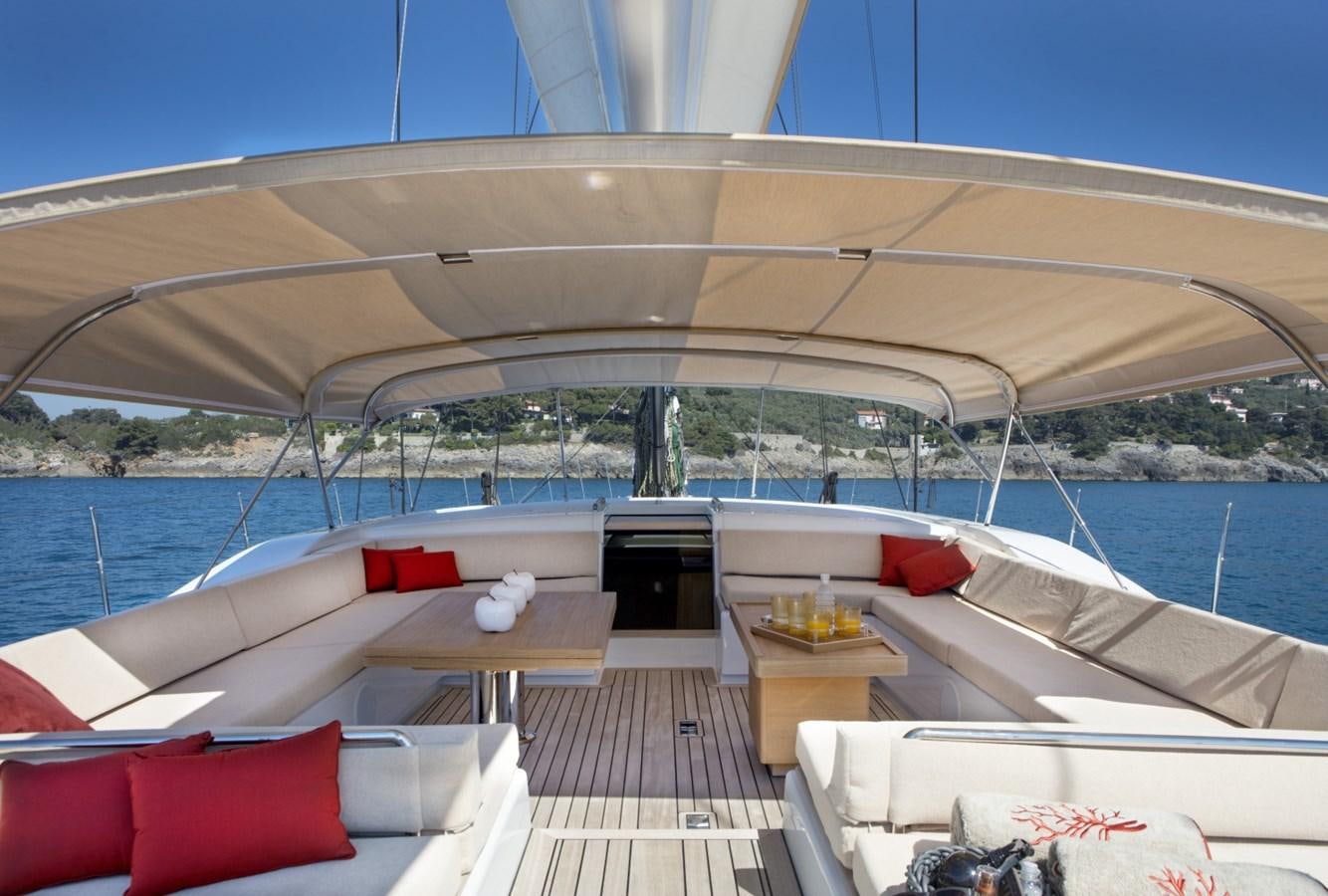 a deck with a view of the water and the land below aboard CROSSBOW Yacht for Sale
