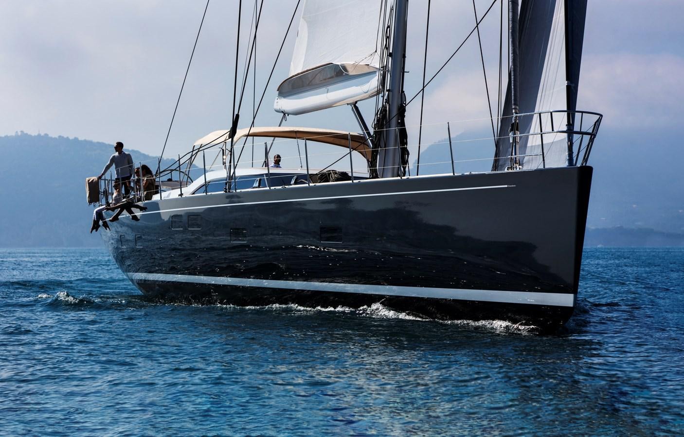 a boat with a person on it aboard CROSSBOW Yacht for Sale