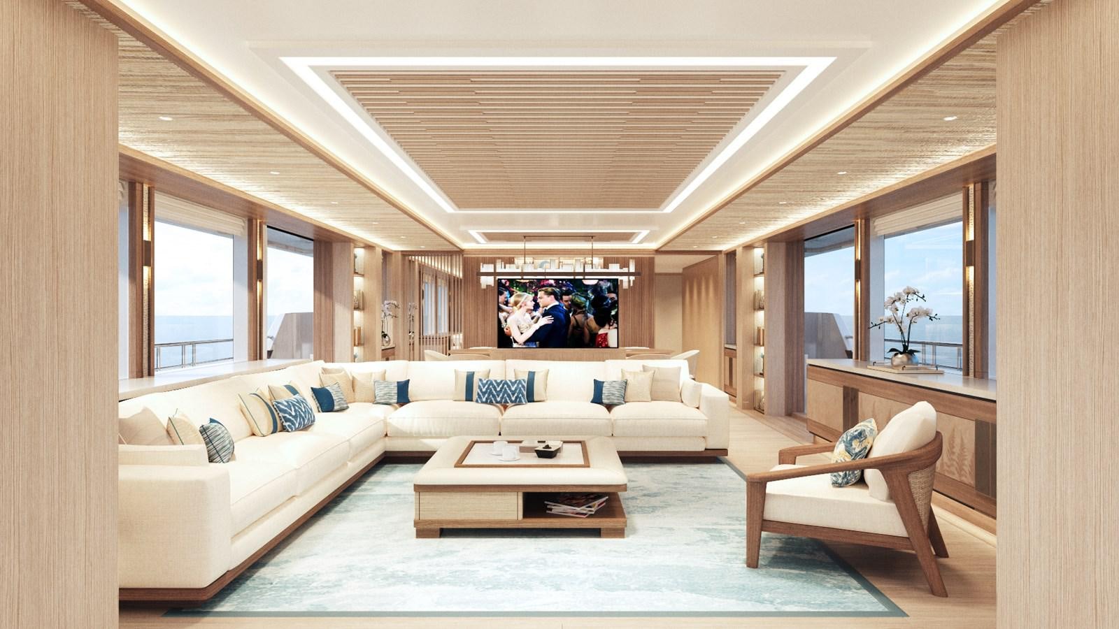 a living room with a large white couch and a large window aboard MOONEN 122 MARTINIQUE Yacht for Sale