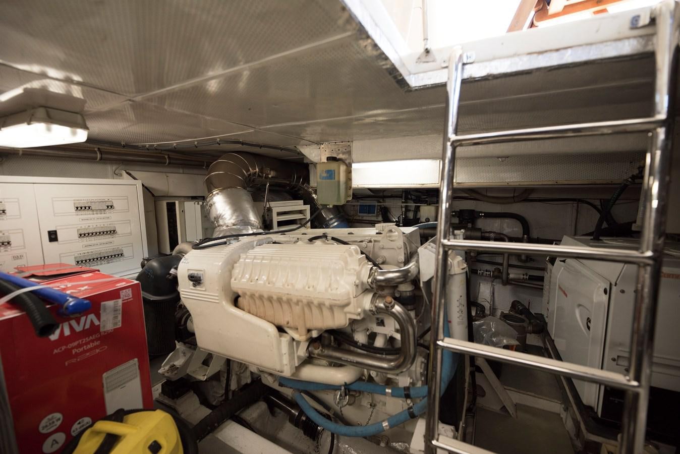 a large white machine with a large white object on the side aboard ITACATOO Yacht for Sale