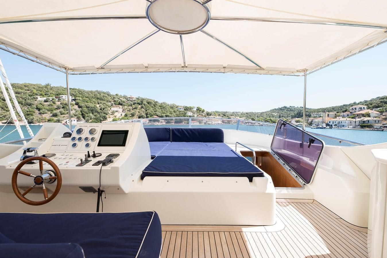 a boat on a deck aboard ITACATOO Yacht for Sale