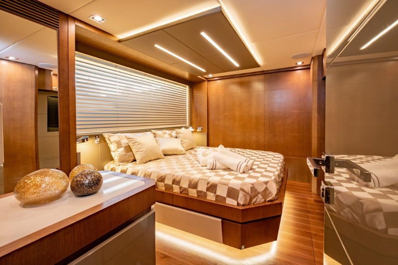 a room with a couple of beds aboard BACCARAT Yacht for Sale