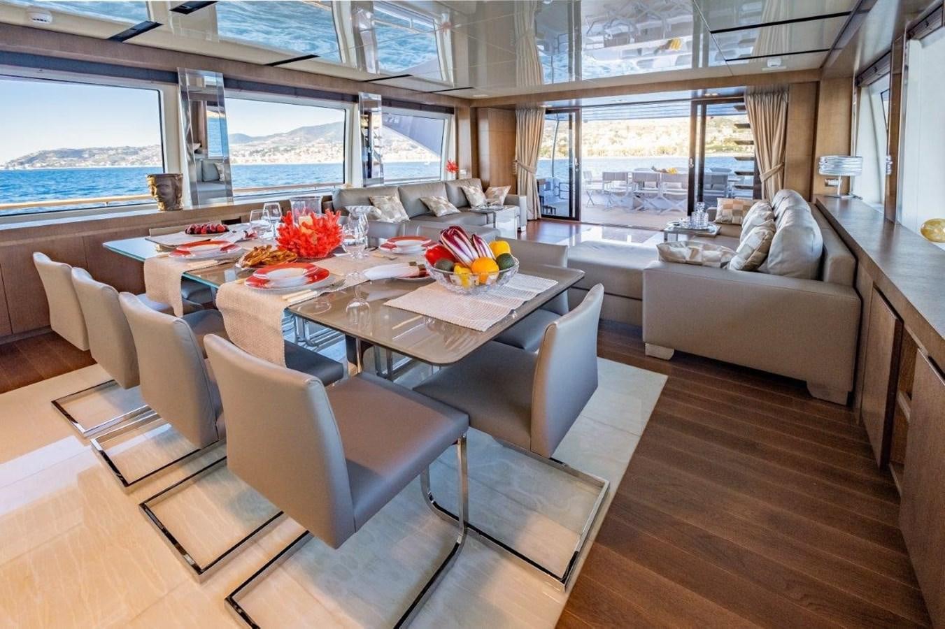 a living room with a large window aboard BACCARAT Yacht for Sale