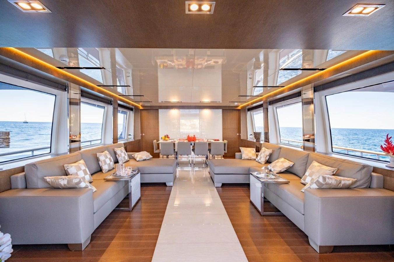 a living room with a large window aboard BACCARAT Yacht for Sale
