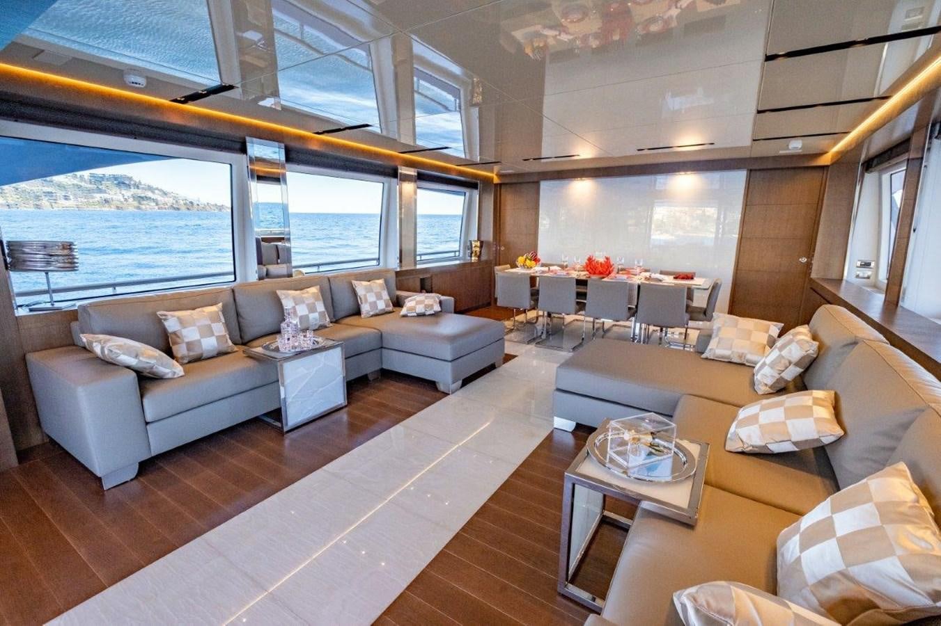 a living room with a large window aboard BACCARAT Yacht for Sale