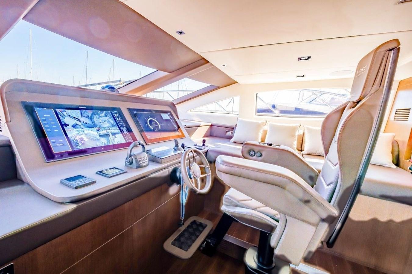 a room with a table and chairs aboard BACCARAT Yacht for Sale